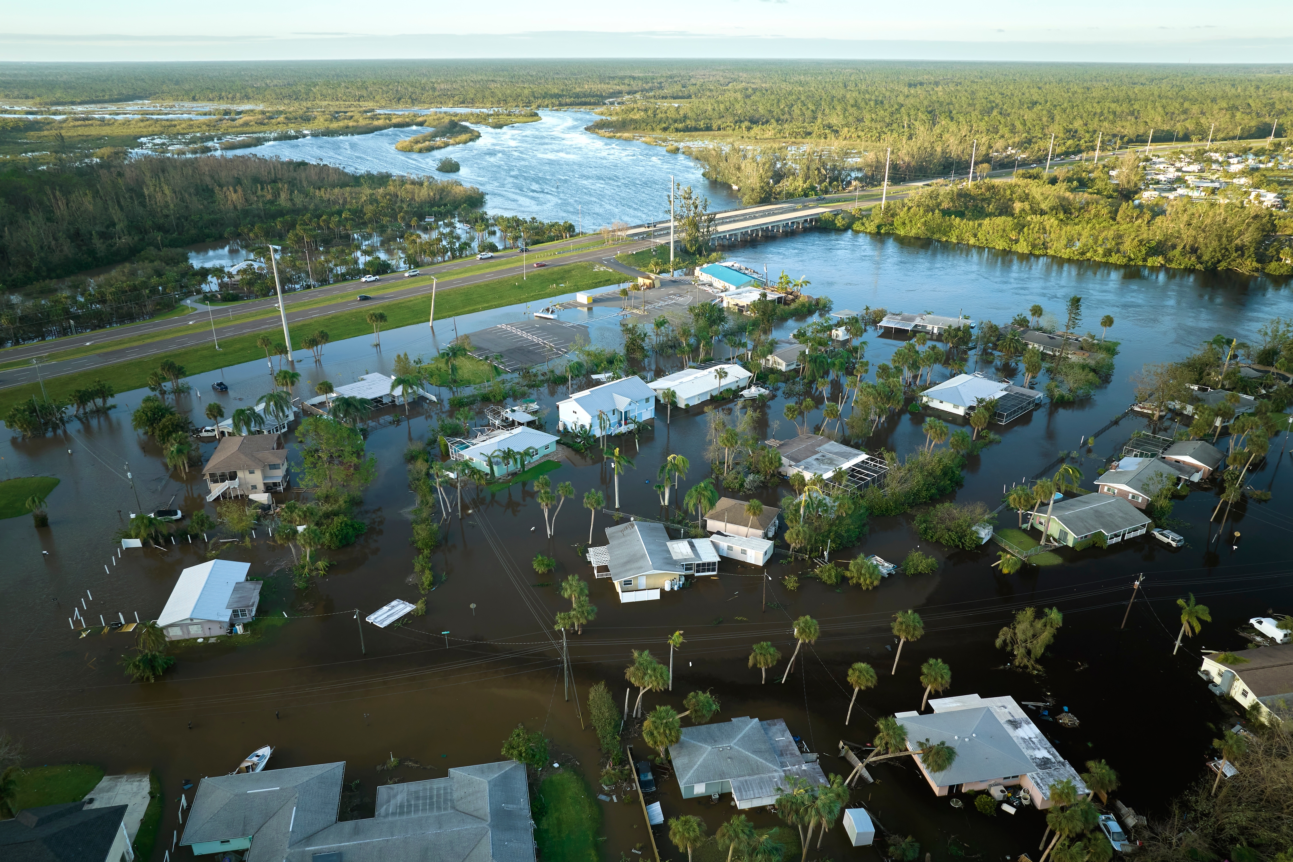 Hurricane Ian flooded houses in a residential area of Florida, causing severe damage due to the natural disaster.